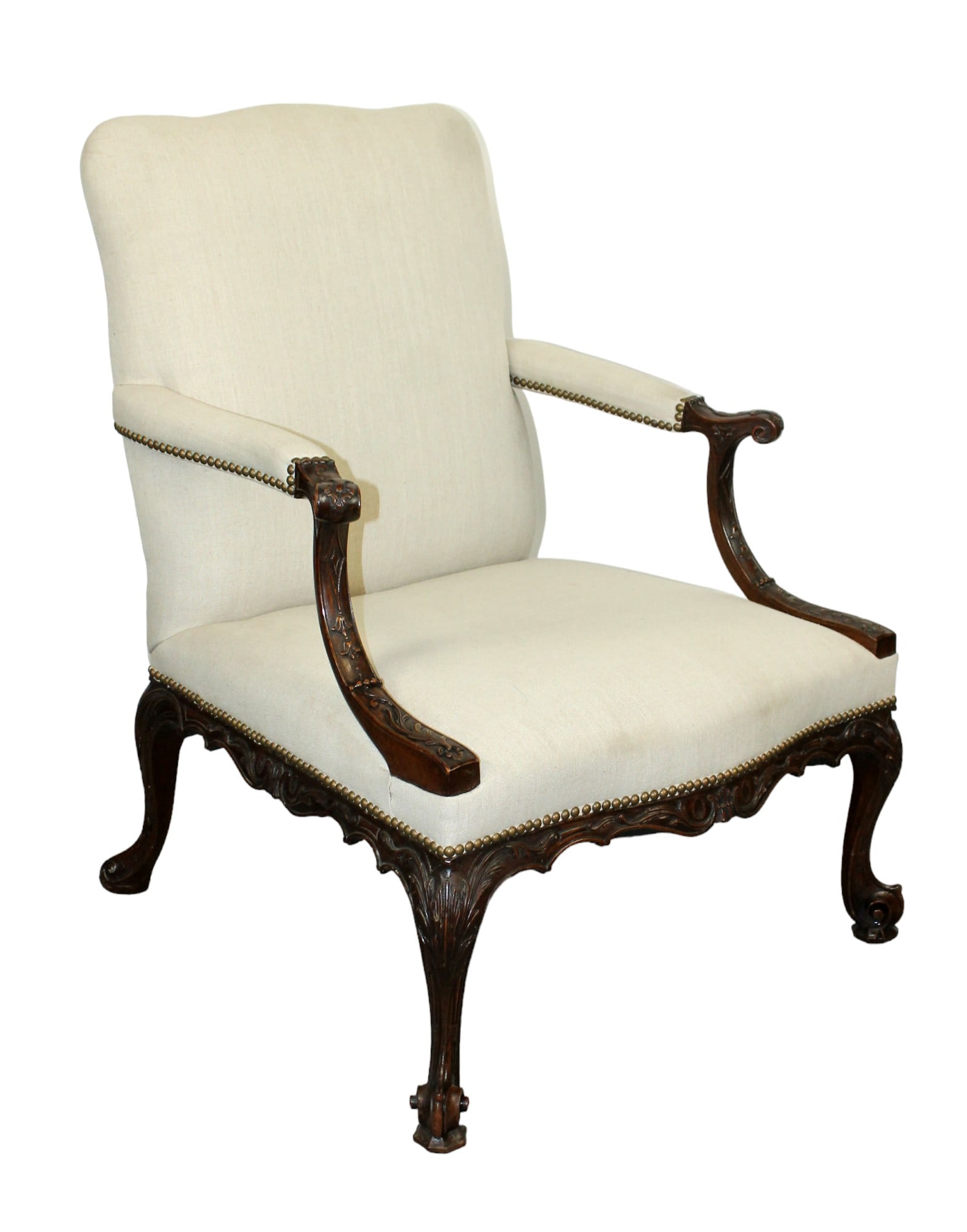 French carved walnut armchair with nail head trim: French carved walnut armchair with nail head trim. Late 19th century. 39"h x 28"w x 26 1/2""d Seat 16 1/2"h