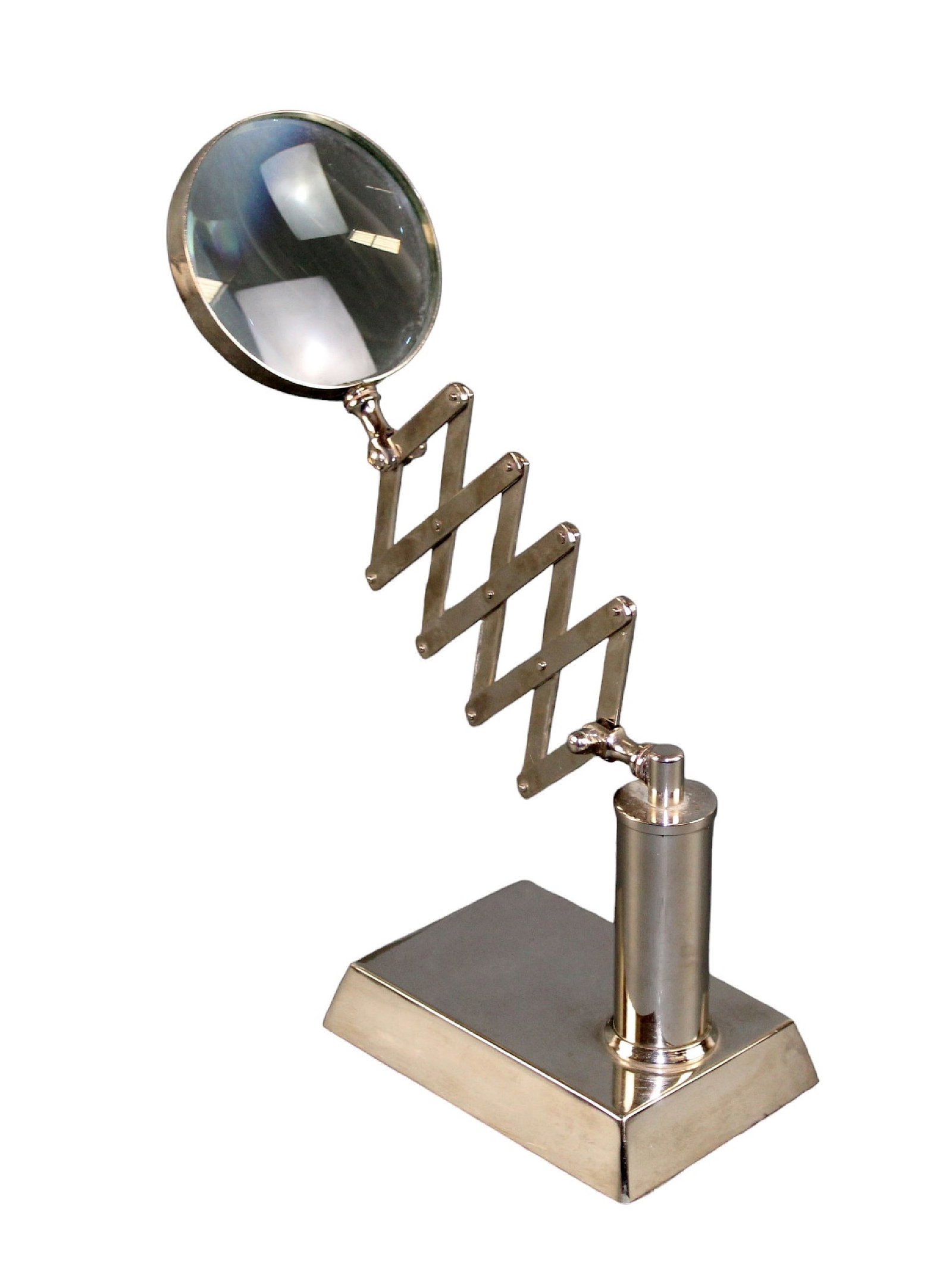 Magnifying glass on a stand: Magnifying glass on a stand. Late 20th century. 7" h x 4" w x 9 1/4" (smallest) and 20 1/2" (longest) d Weight: 3lbs