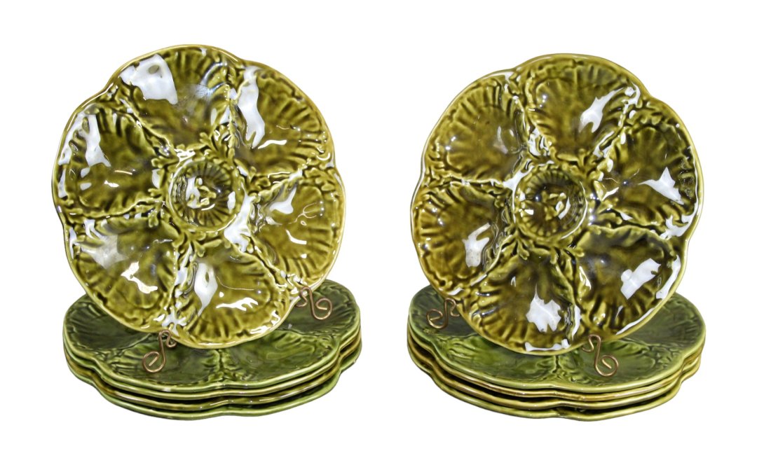 Lot of 10 French Gien oyster plates: Lot of 10 French Gien oyster plates. All plates are Gien and same pattern. The color varies. 6 are similar and 4 are similar. Each plate measures 9 3/4"diameter. Weight: 14lbs.