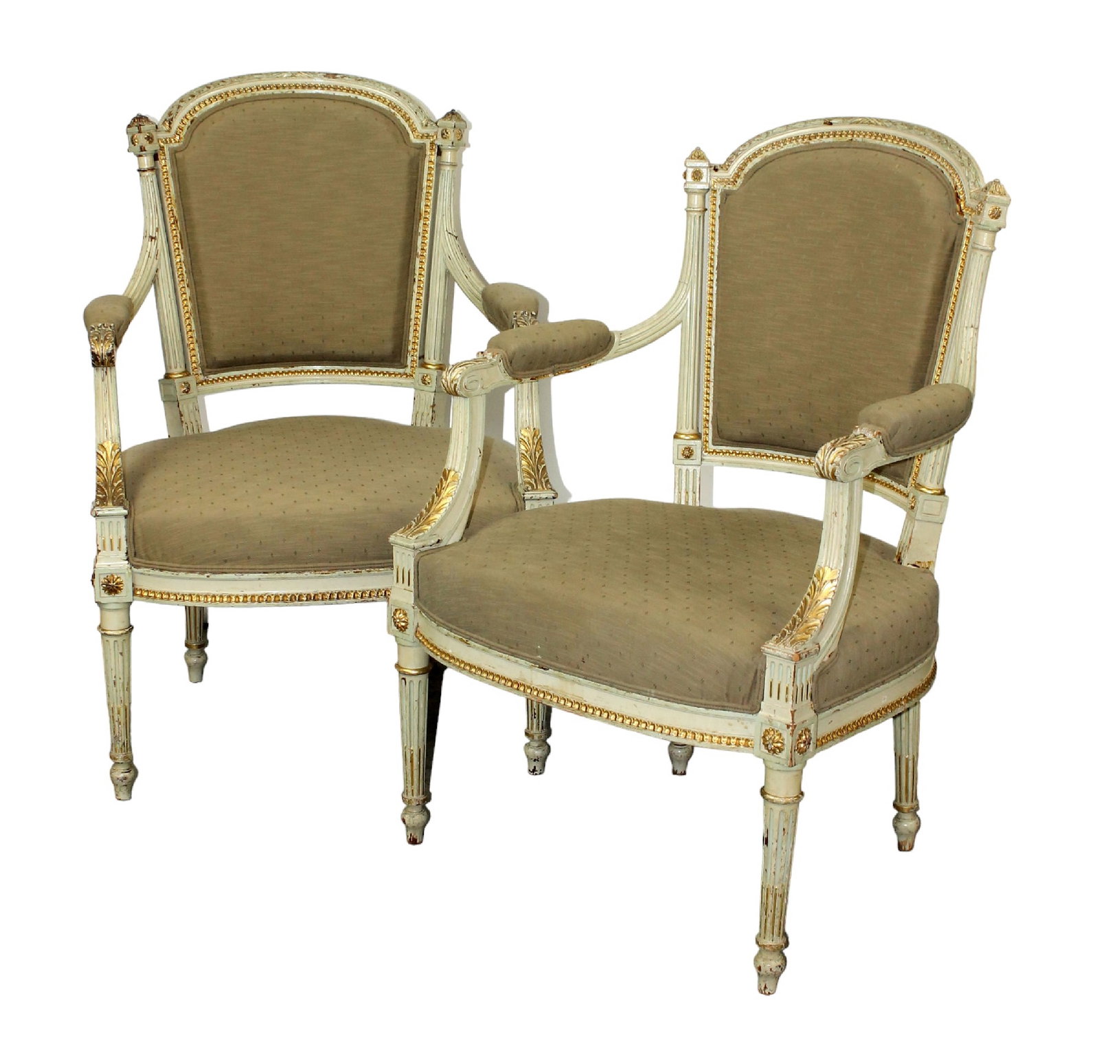Pair of French Louis XVI style painted armchairs with gilt detail: Pair of French Louis XVI style painted armchairs with gilt detail. Early 20th century.36"h x 24"w x 22"d Seat 17"h