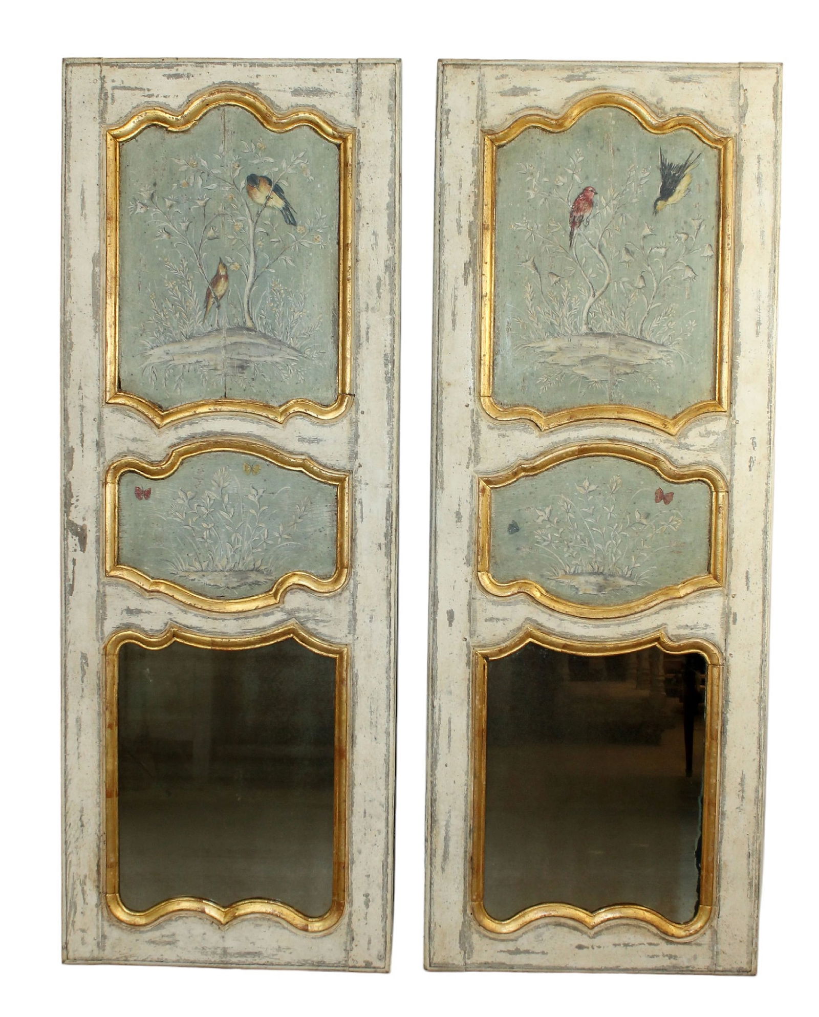 Pair of French Regency trumeau mirrors with a hand painted finish: Pair of French Regency trumeau mirrors with a hand painted finish. Frames early 19th century. Painting is later. 72"h x 26 1/2"w
