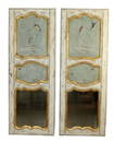 Pair of French Regency trumeau mirrors with a hand painted finish