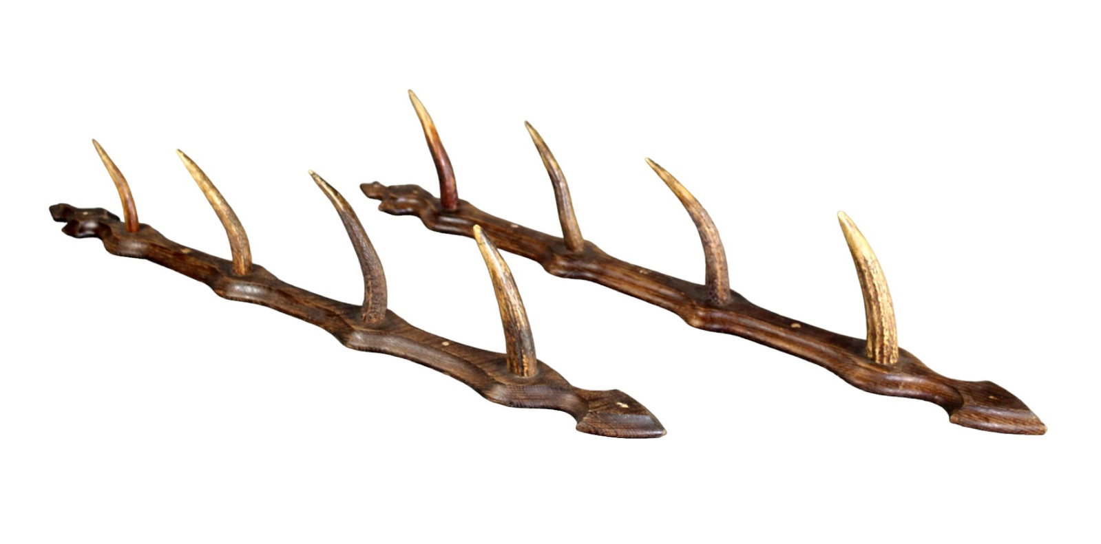 Pair French hunting lodge antler wall hooks: Pair French hunting lodge antler wall hooks. Early 20th century. Each measure approx: 31 1/2"l x 2 5/8"w x 5 5/8"d. Each weigh approx: 2lbs