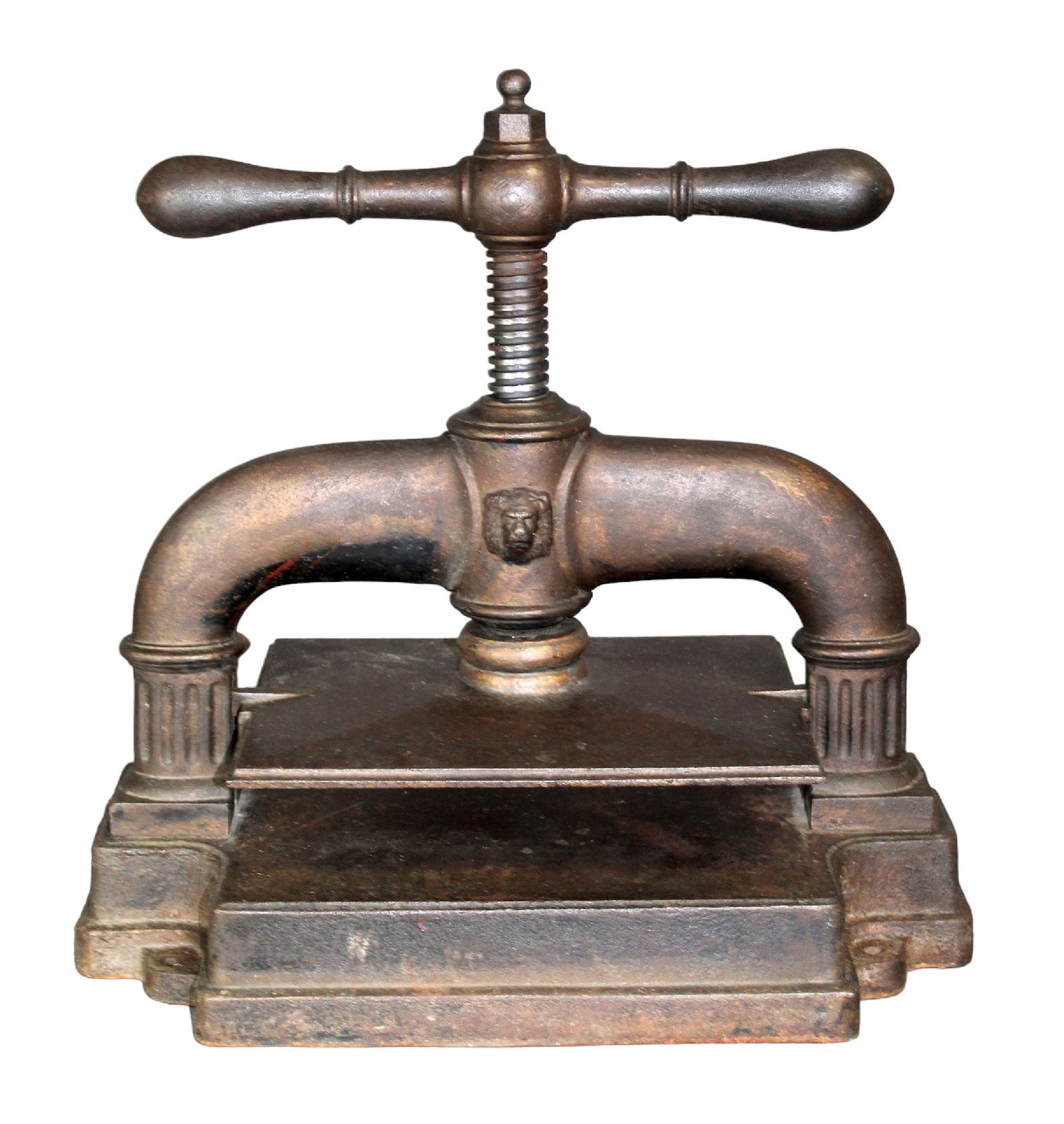 French cast iron book press: French cast iron book press with lion mask. Late 19th century. Weight 100lbs. 16 1/2"h to 18 1/2"h x 18 1/2"w x 11"d Plate size: 11 1/2"w x 91/4"d