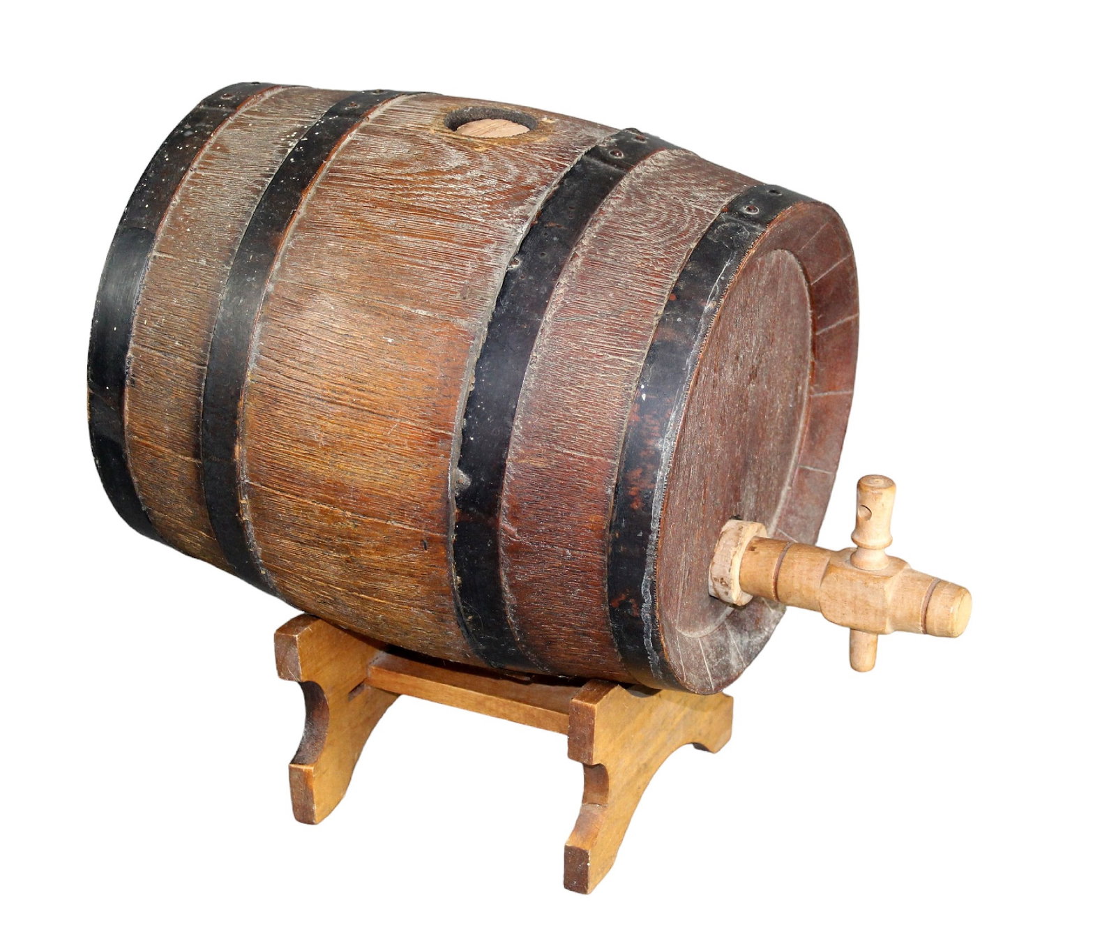 French miniature oak and iron banded wine barrel: French miniature oak and iron banded wine barrel on stand. Barrel on stand: 11 1/2"h x 8 1/2"diam x 10"d (just the barrel) x 13 3/4"d (barrel with spigot). Stand: 3 1/2"h x 5 7/8"w x 5 1/2"d. Total we