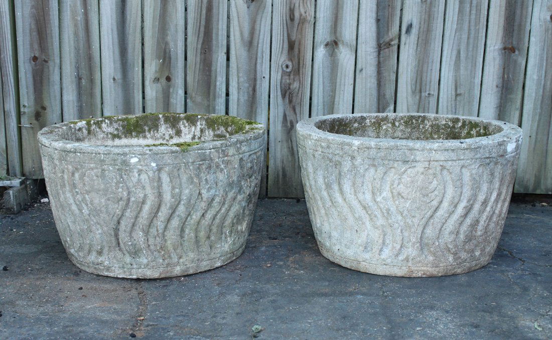 Pair of cut stone garden planters with figures (1 of 10)