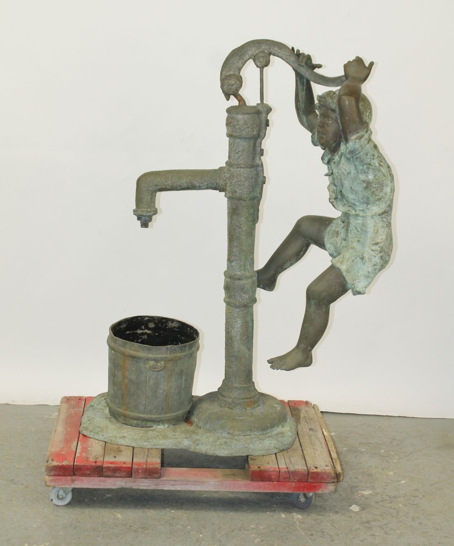 Bronze sculpture of boy playing with water pump (1 of 8)