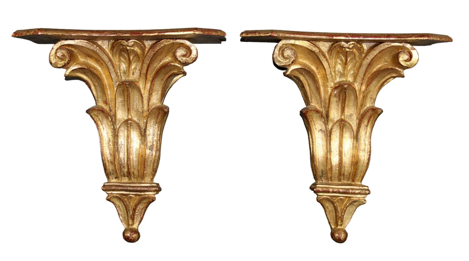 Pair of Italian laurel leaf wall shelves: Pair of Italian laurel leaf wall shelves in gilt painted finish. Each measures approx: 14 3/8"h x 13 3/4"w x 7"d. Total weight: 7lbs