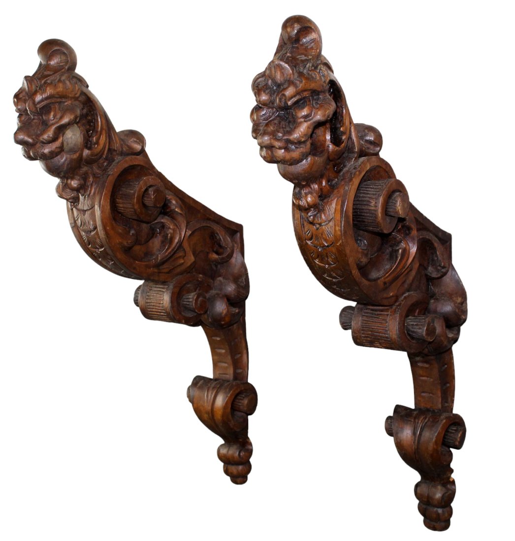 Pair of French carved oak curtain rod holders with griffins: Pair of French carved oak curtain rod holders with griffins. Late 19th century. Each measure approximately: 30 1/4"h x 6 1/8"w x 19 5/8"d. Each weigh: 7lbs