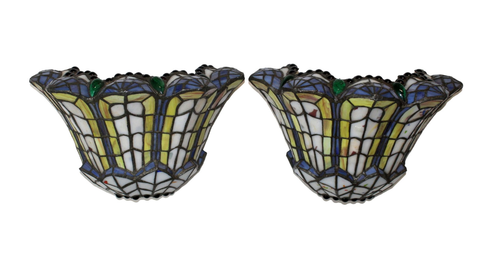 Pair of stained and leaded glass sconce covers: Pair of stained and leaded glass sconce covers. Each measures approx: 8 1/2"h x 12 3/4"w x 7"d. Each weigh: 2ibs