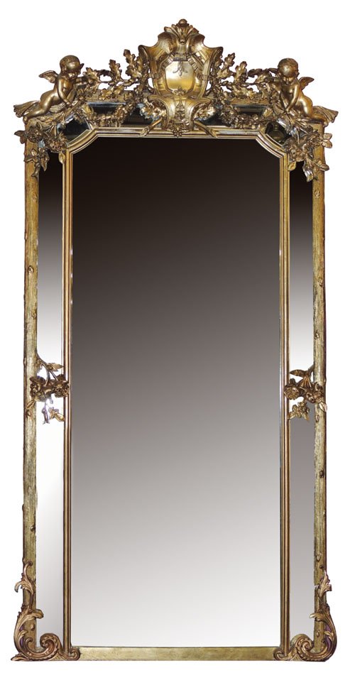 Italian 19th century gilt beveled mirror w/ cherubs: flanking a central crest. Oak leaf & acorn garland, floral garland with roses in full bloom. 90 1/4"H x 47 1/2"W
