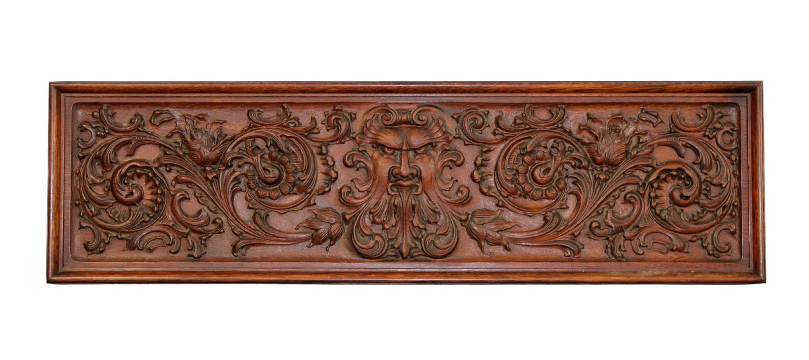 Antique relief carved oak panel with mask (1 of 8)