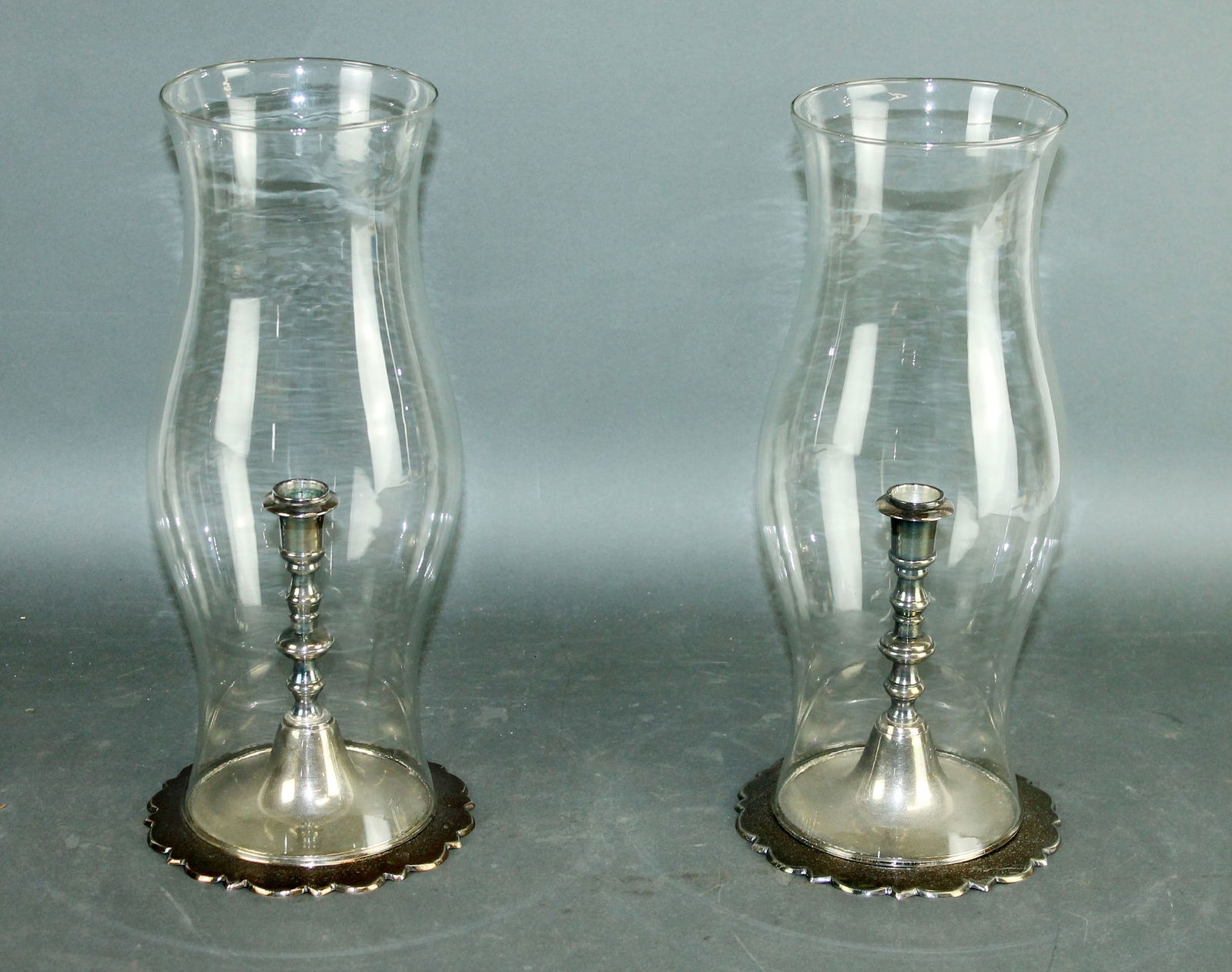Pair Of Silver Plated Candlesticks With Glass Hurricanes Auction