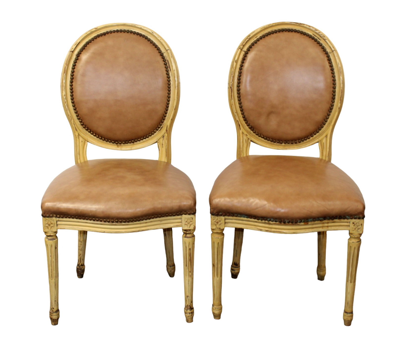 Pair of Louis XVI style side chairs with leather upholstery: Pair of Louis XVI style side chairs with leather upholstery. Early 20th century. 38"h x 20 1/2"w x 17 1/2"d Seat 18"h