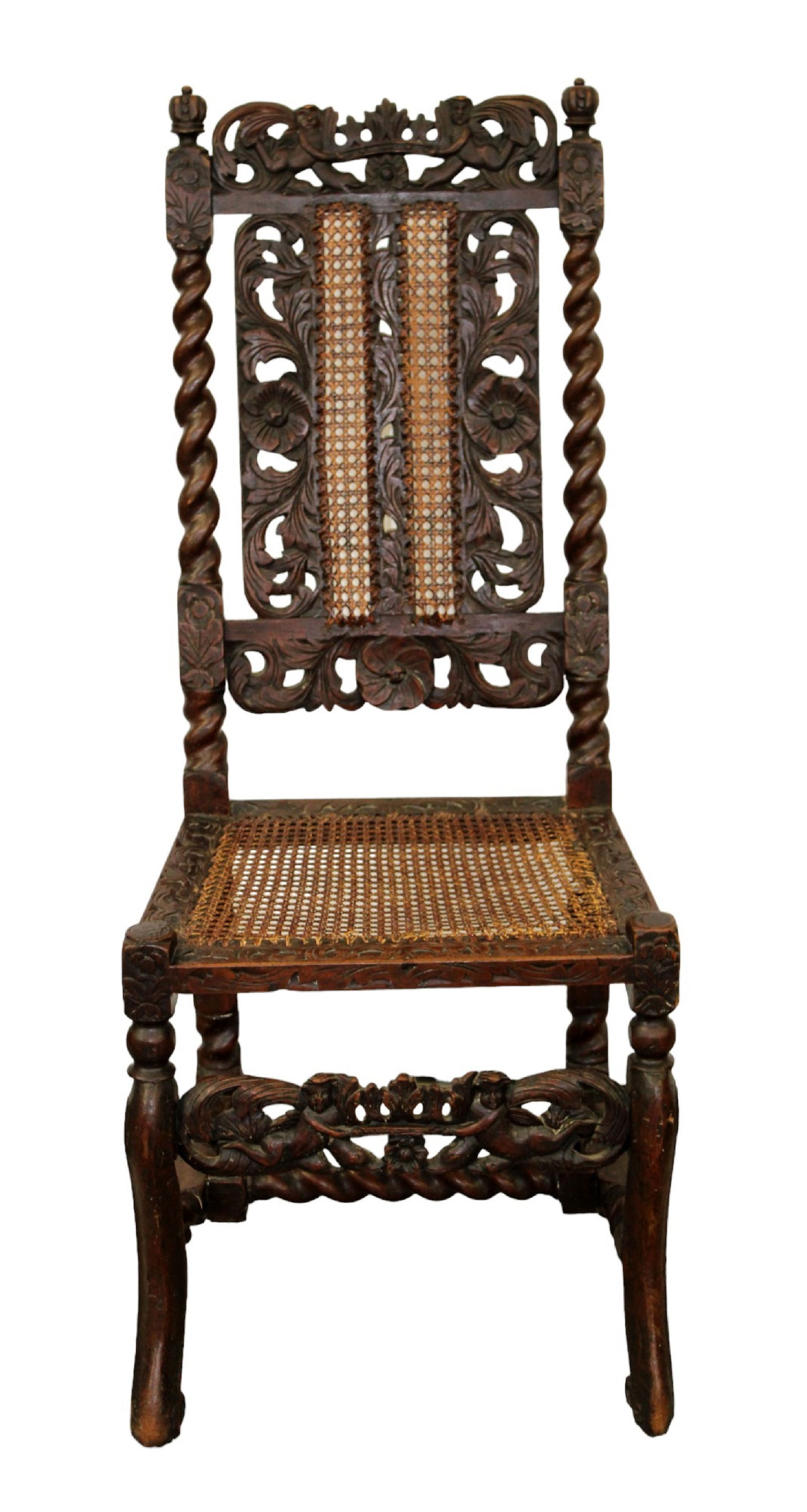 English Tudor side chair in carved walnut with cane seat and barley twist columns (1 of 11)