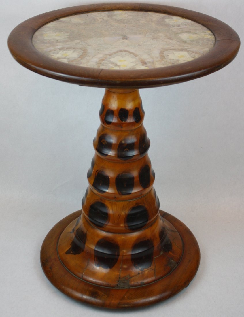 Art Deco butterfly specimen table in brazilwood: with butterfly specimens under glass top. Circa 1930-1950. Table bears paper makers label of Carlos Zipperer Sobr Brazil. 26"h x 21 1/8"dia