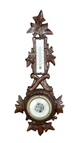 Black Forest barometer in carved walnut