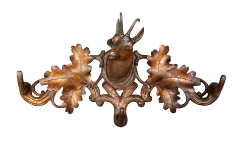 Black Forest carved wall mount coat rack with antelope mount