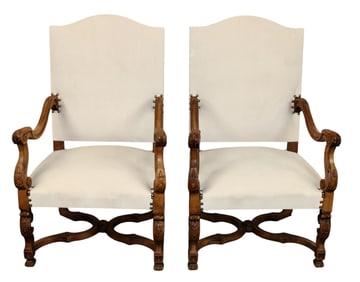 Pair of French Louis XIV carved oak armchairs