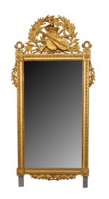French Louis XVI gold leaf mirror with laurel leaf crest with instruments