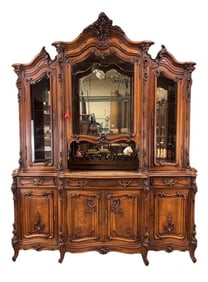 French Louis XV carved walnut buffet with beveled glass doors
