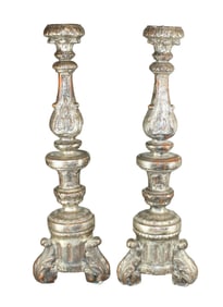 Pair of Italian carved and silver leaf over wood altar candle holders