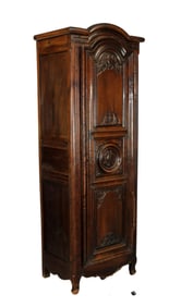 French Provincial bonnetiere cabinet in walnut with carved bird