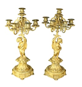 Pair of French gilt bronze candelabra with putti