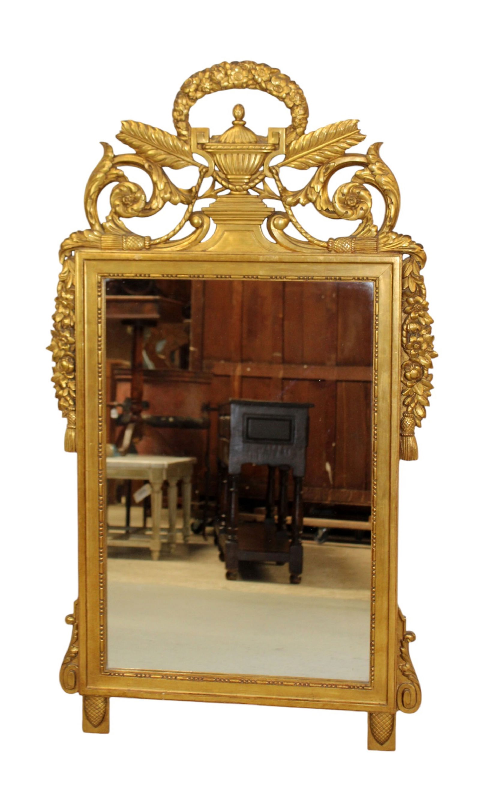 French Louis XVI style giltwood mirror with urn and floral garland: French Louis XVI style giltwood mirror with urn and floral garland focal. Mid 20th century. 52"h x 30"w