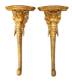 Pair of relief carved elephant form wall shelves