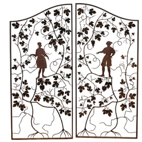 Pair of French iron garden gates with silhouetted figures