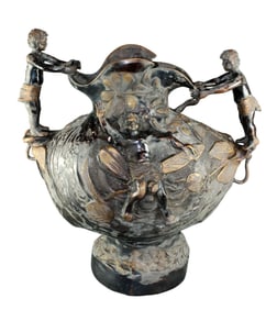 Bronze urn with cherubs and figural handles