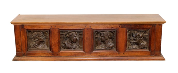 Italian stand in walnut with relief carved portrait plaques
