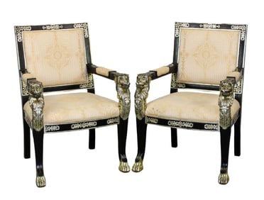 Pair of Empire style armchairs with lions