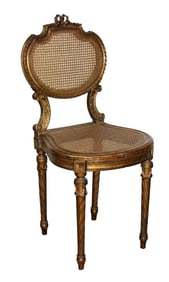 French Louis XVI style caned side chair in gilt finish