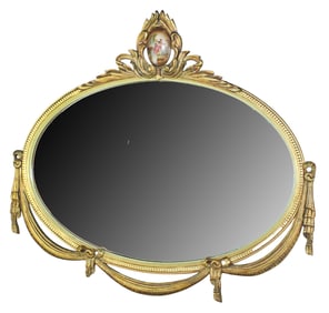 Louis XVI style oval mirror with porcelain plaque