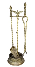Brass fireplace tools with focal eagle