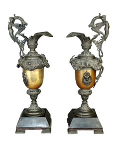 Pair of spelter ewers on footed bases