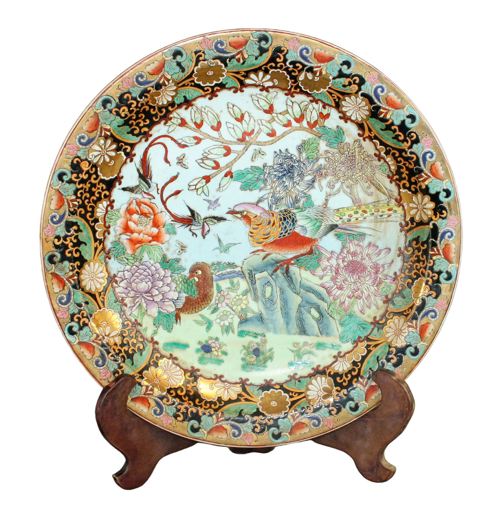 Oversize Chinese porcelain charger with birds: Oversize Chinese porcelain charger with birds. On wooden easel. Charger 2 3/4"h x 20 1/4"dia Weight: 14lbs Stand 18 1/4"h