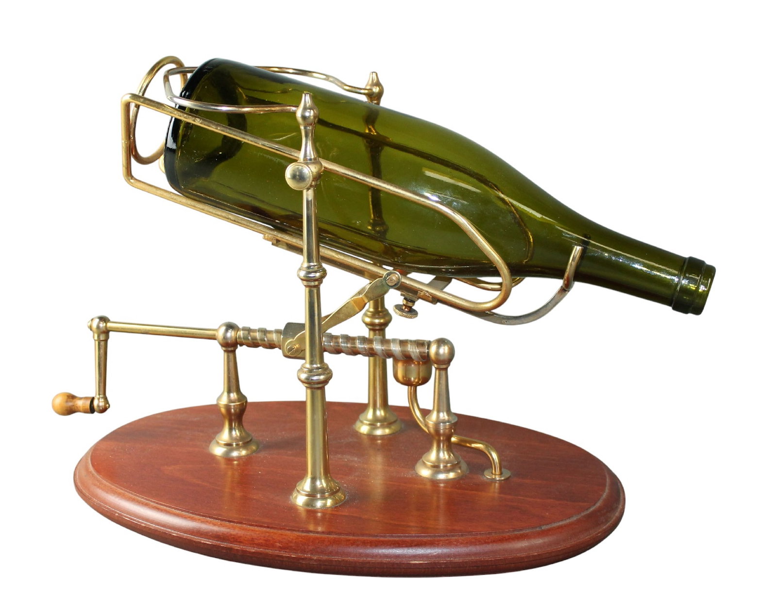 French mechanical wine decanting cradle in brass with candle holder: French mechanical wine decanting cradle in brass with candle holder. Circa 1960's. 10"h x 13"w x 8 1/2"d Weight: 5lbs
