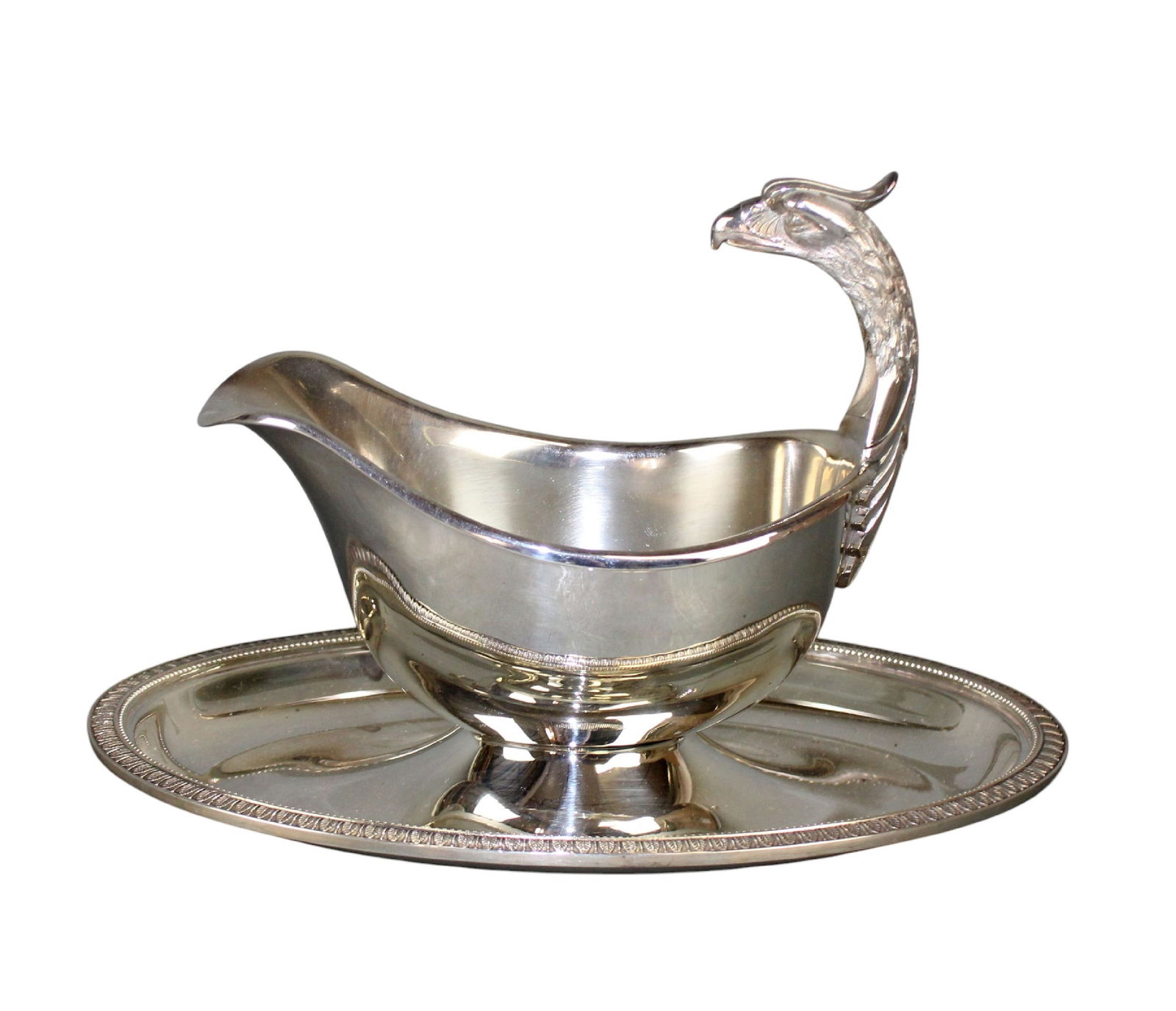 Christofle France silverplate gravy boat with eagle: Christofle France silverplate gravy boat with eagle. Marked Christofle France. 6"h x 9"l x x5 3/4"w Weight: 2lbs