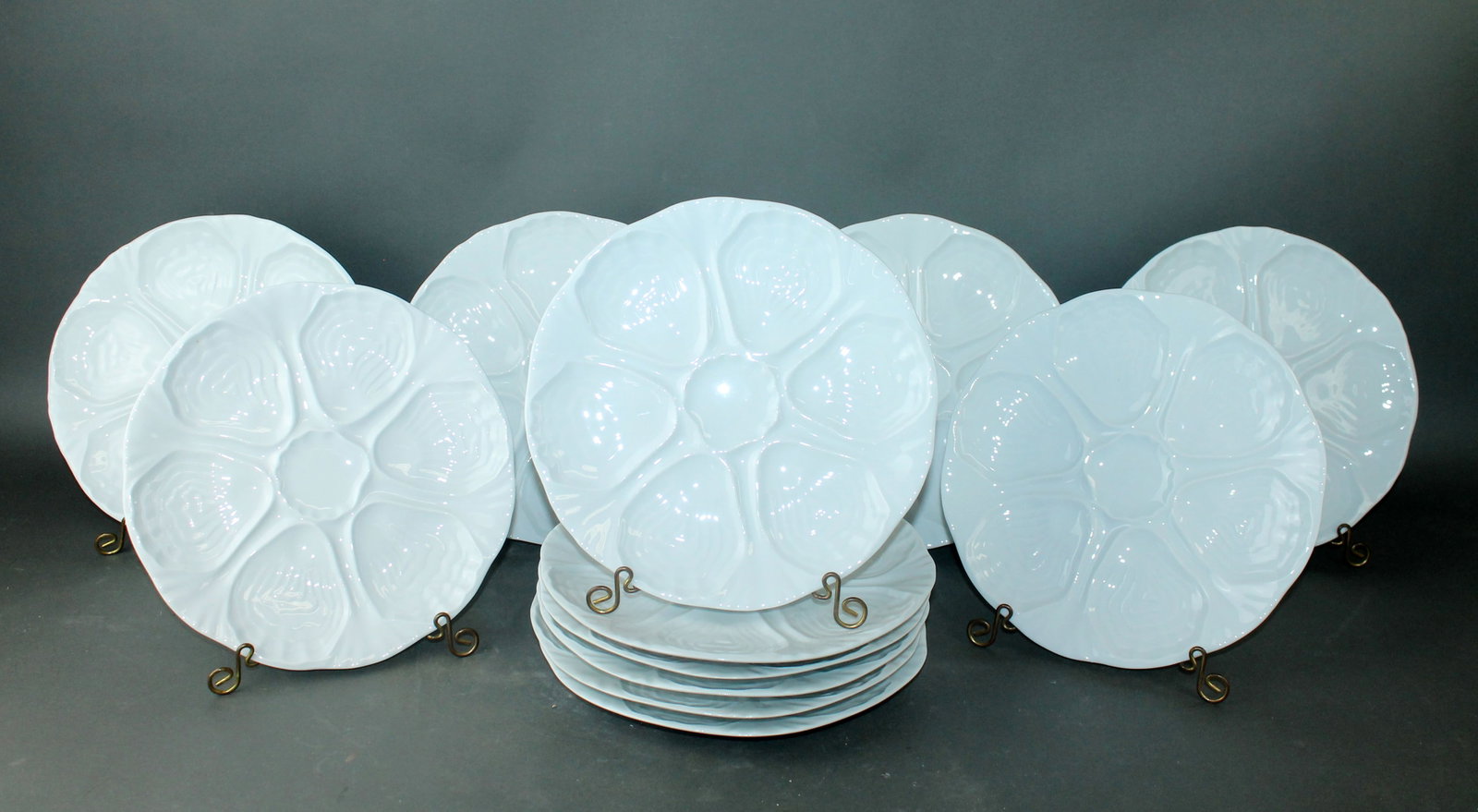 Set of 12 French Limoges porcelain oyster plates: Set of 12 French Limoges porcelain oyster plates . 9 5/8" dia Weight 6lbs