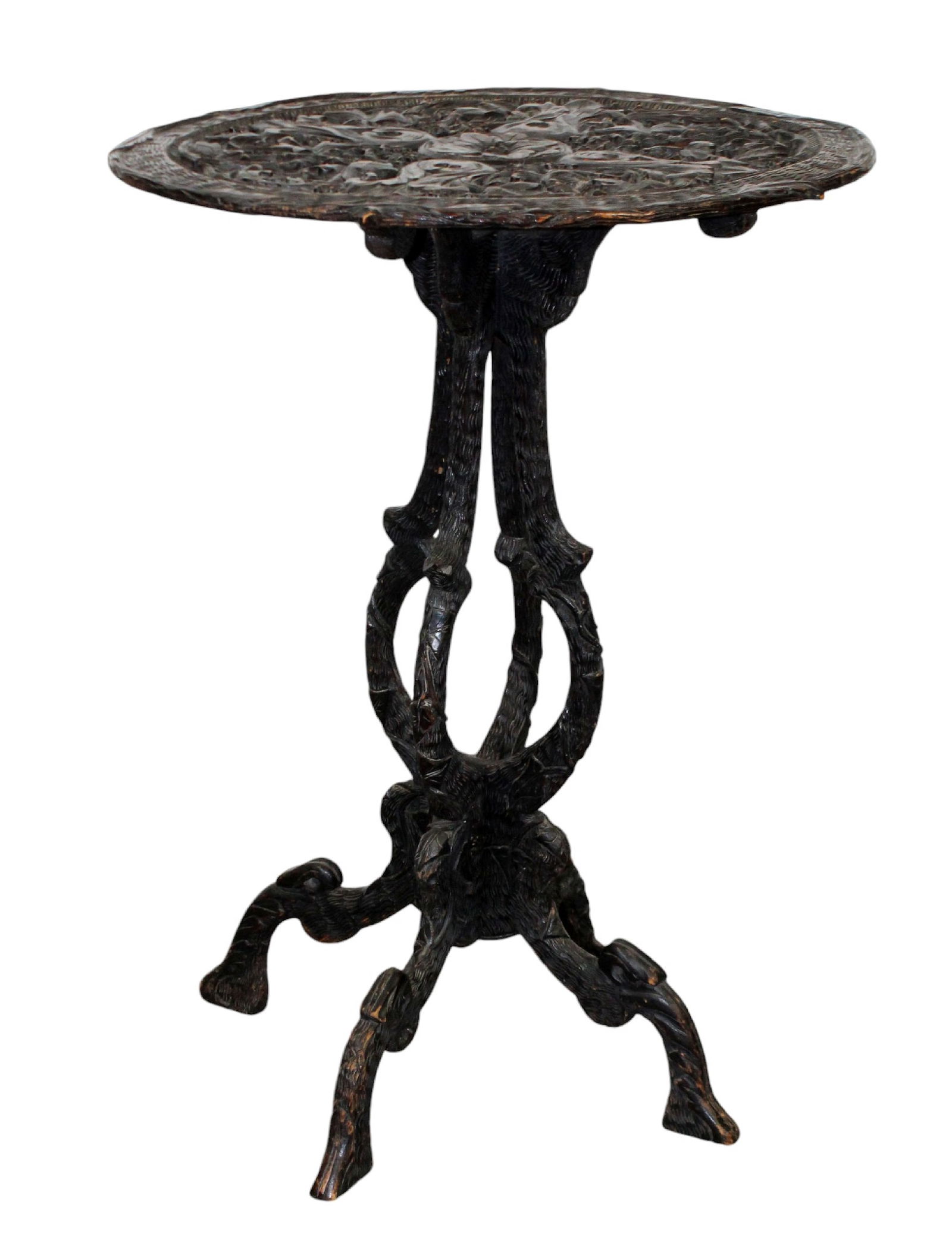 Black Forest pedestal base smoking table in carved walnut: Black Forest pierce carved side table on open form pedestal base with 4 legs. Late 19th century. 31"h x 23"w x 18"d