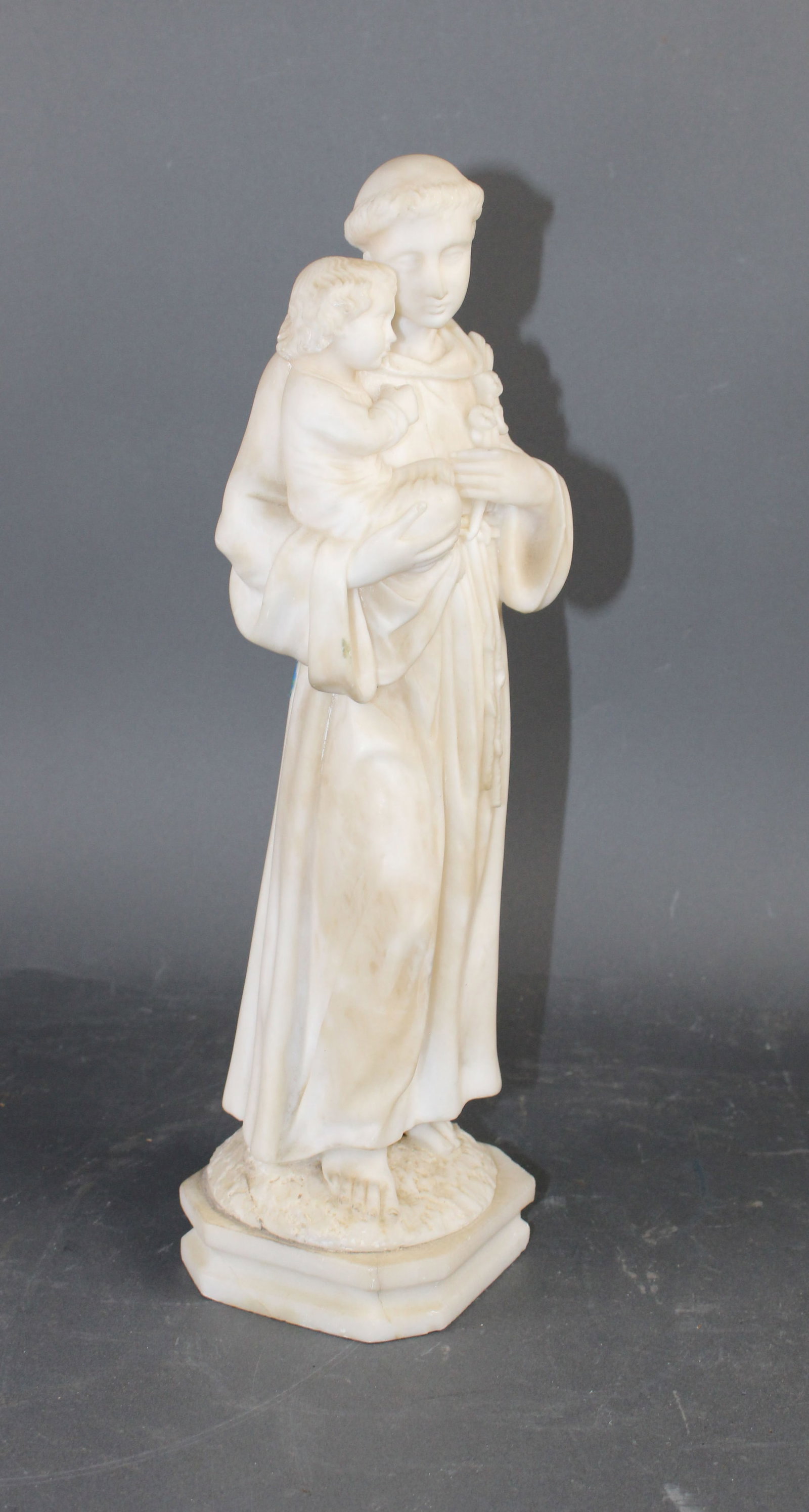 Italian carved white marble sculpture of Saint Anthony: Italian carved white marble sculpture of Saint Anthony. 16"h x 5 1/2"w x 4 1/2"d Weight: 12 lbs
