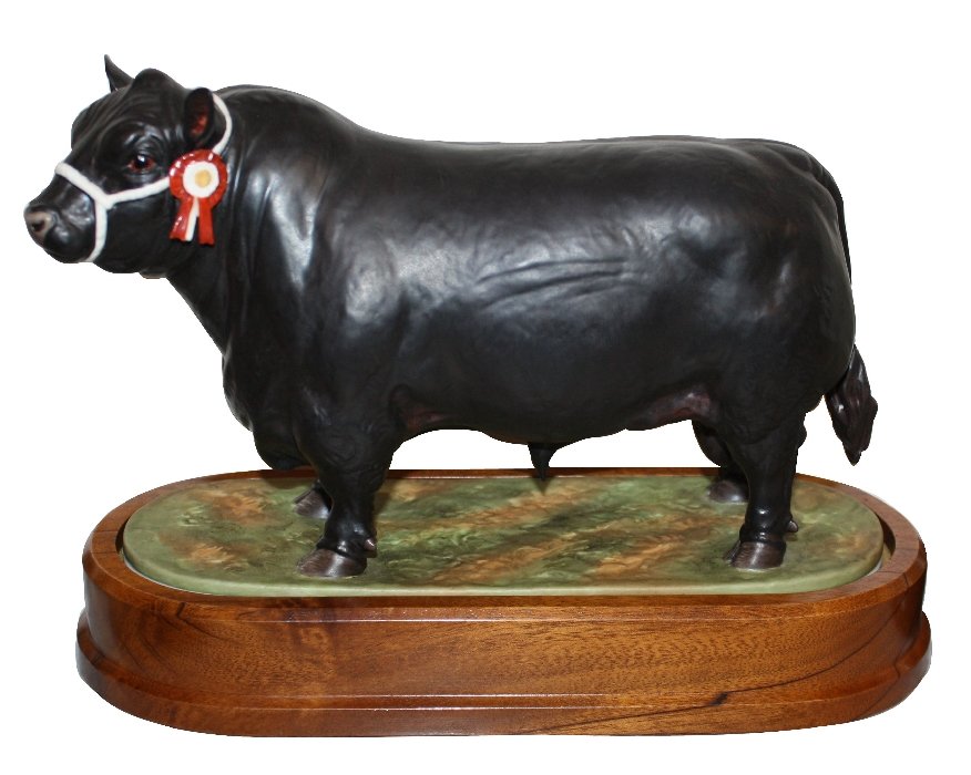 Royal Worcester limited edition Aberdeen-Angus bull: 1961. English bone china figurine on Wooden plinth. 8 1/4"h x 10 1/2"l