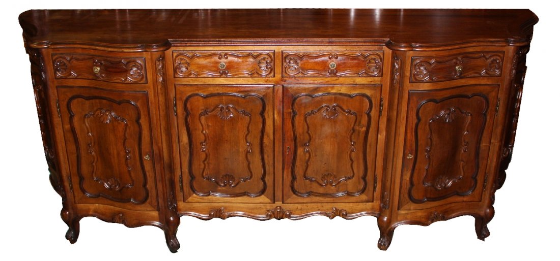 Italian Baroque sideboard in walnut: Early 20th century. 102 1/2"l x 42 1/4"h x 25 3/8"d