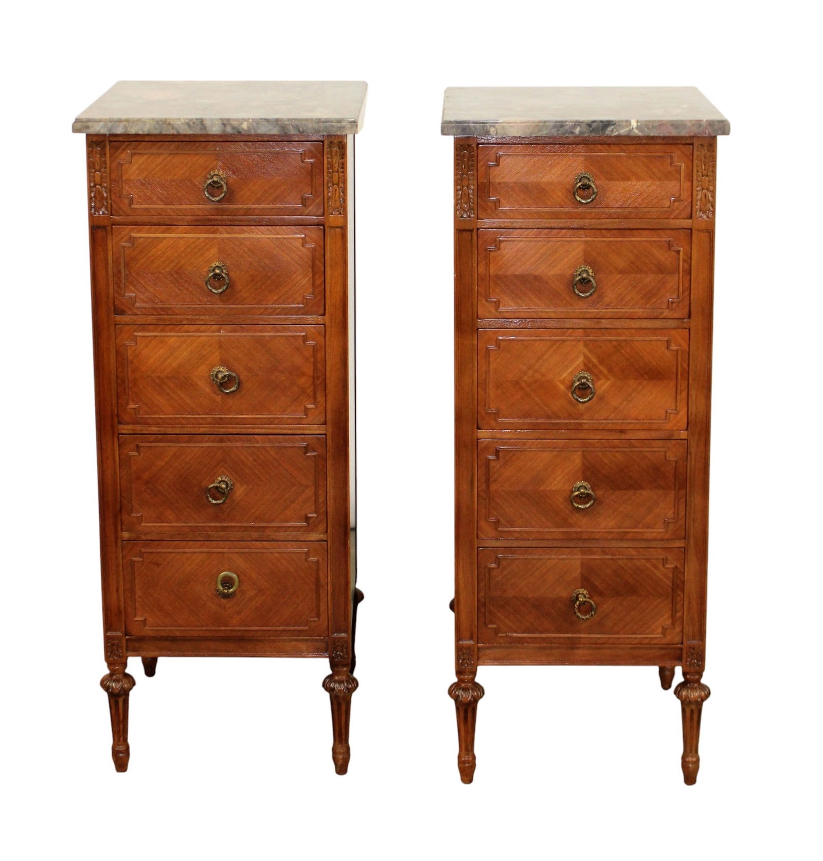 Pair of French Louis XVI style 5 drawer commodes with marble tops: Pair of French Louis XVI style 5 drawer semainier commodes in mahogany with marble tops. Mid 20th century. 40"h x 16"w x 17"d