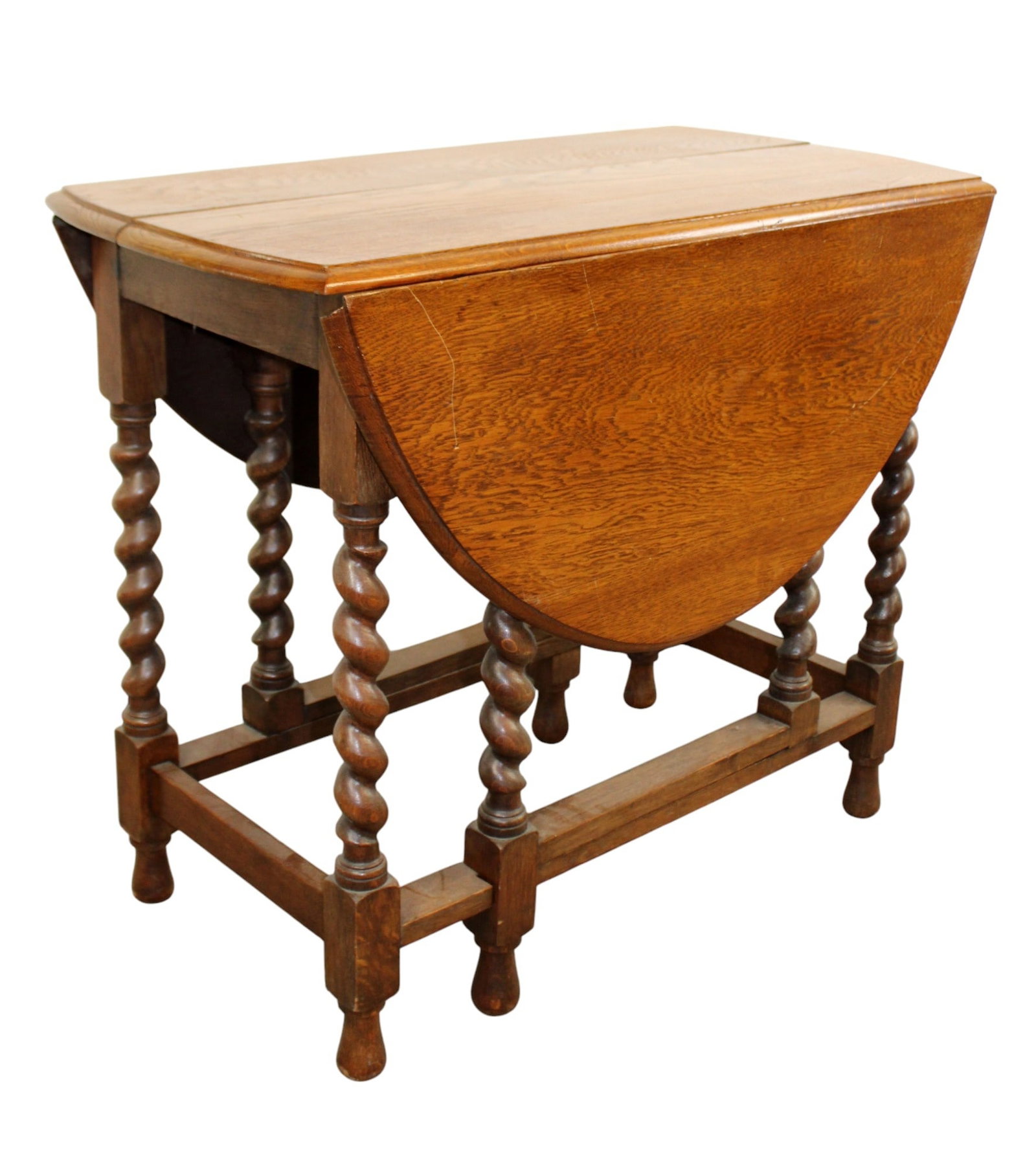 English barley twist drop side gate leg table: English barley twist drop side gate leg table in oak. Mid 20th century. 28"h x 35 1/2"w x 18 1/2"d, with leaves extended measures 45 1/2"w