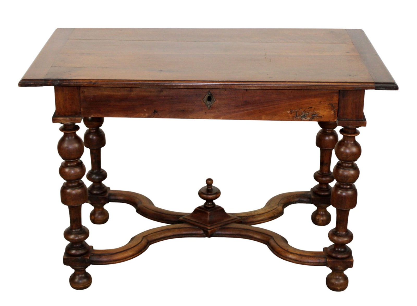 French Louis XIII bureau plat desk in walnut: French Louis XIII bureau plat desk in walnut with crossed stretcher and center finial. Single drawer. Early 19th century. 28 1/2"h x 44"w x 25"d