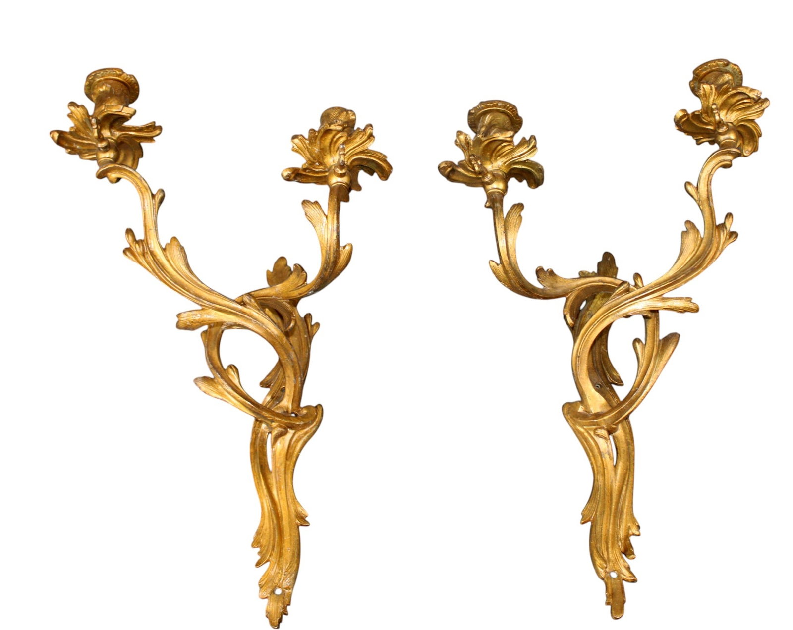 Pair of French Louis XV style 2 arm bronze wall sconces: Pair of French Louis XV style 2 arm bronze candle wall sconces. Approx 18 3/4"h x 11 1/4"w. Weight: 3lbs each.